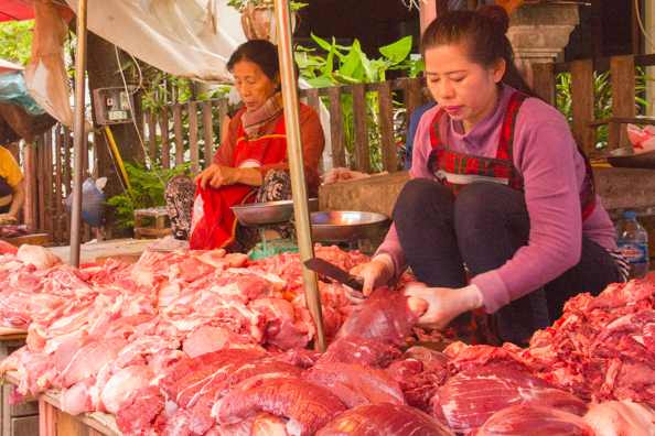 Fresh meat stalls at the morning market in Luang Prabang