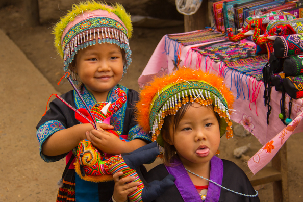 Children selling souvenirs in a Hmong village near Luang Prabang